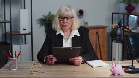 senior business woman director having interview job discussion, video conference call at home office