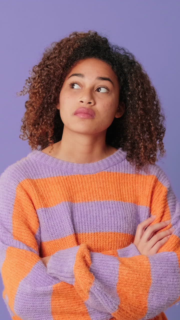 Woman with Curly Hair in Striped Sweater