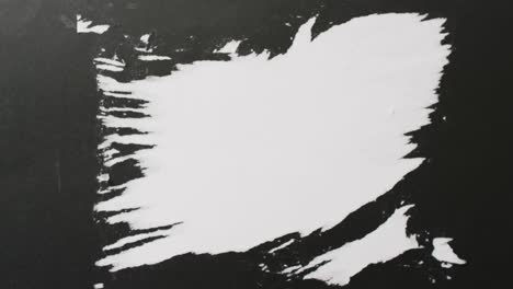 video of close up of strokes of black paint with copy space on white background