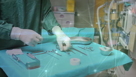 red de conexiones contra la sección media del cirujano que inspecciona el equipo médico
