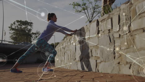 stretching against stone wall, woman exercising with network connections animation