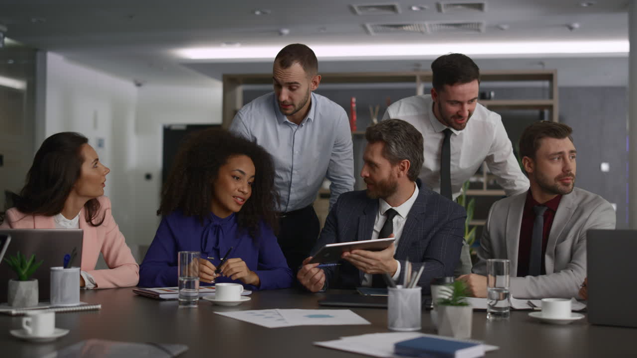 Multiethnic business group talking