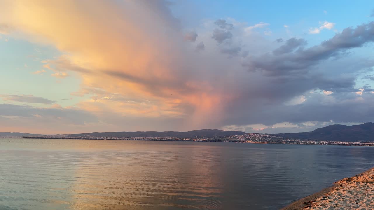 Golden hour skyline Thessaloniki city Greece coastline Aegean Sea cloudy sky