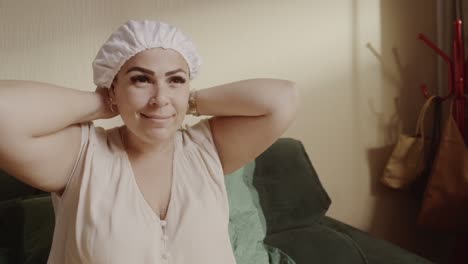 woman in shower cap at home