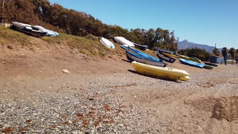 Pequeñas-Tablas-De-Pesca-En-La-Playa-De-España,-Costa-Del-Sol,-Marbella,-Málaga,-España