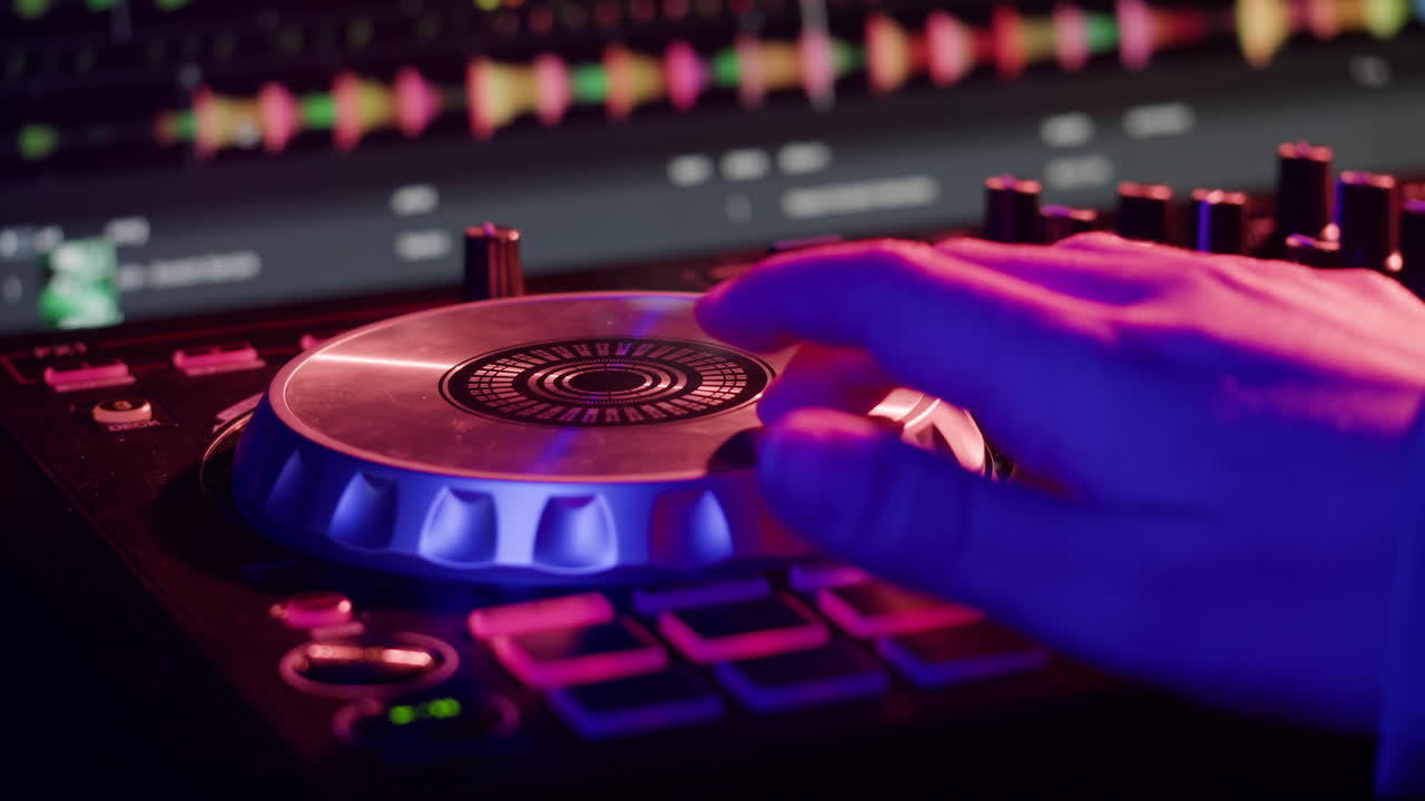 DJ with headphones and sunglasses playing music on festival in night club. Techno musician performing at nightclub for concert crowd of people, city bar.