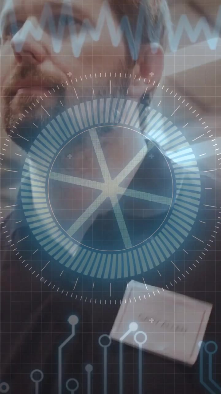 Vertical video: Tech entering frame in plant, HUD appearing over face highlighting badge for ID