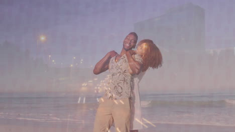 couple embracing on sandy beach at sunset, with heart icon floating and health chart