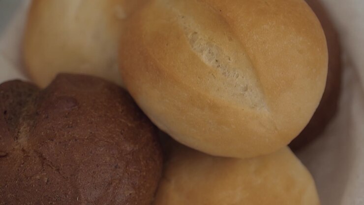 table is served with fresh rolls 2