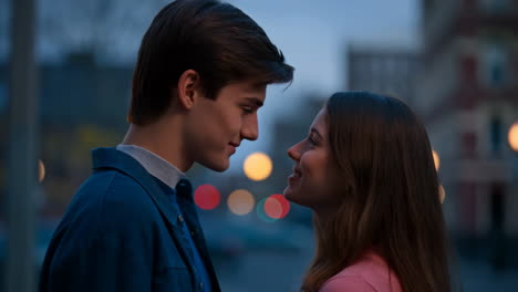 Young Couple Sharing an Affectionate Moment in the City at Night