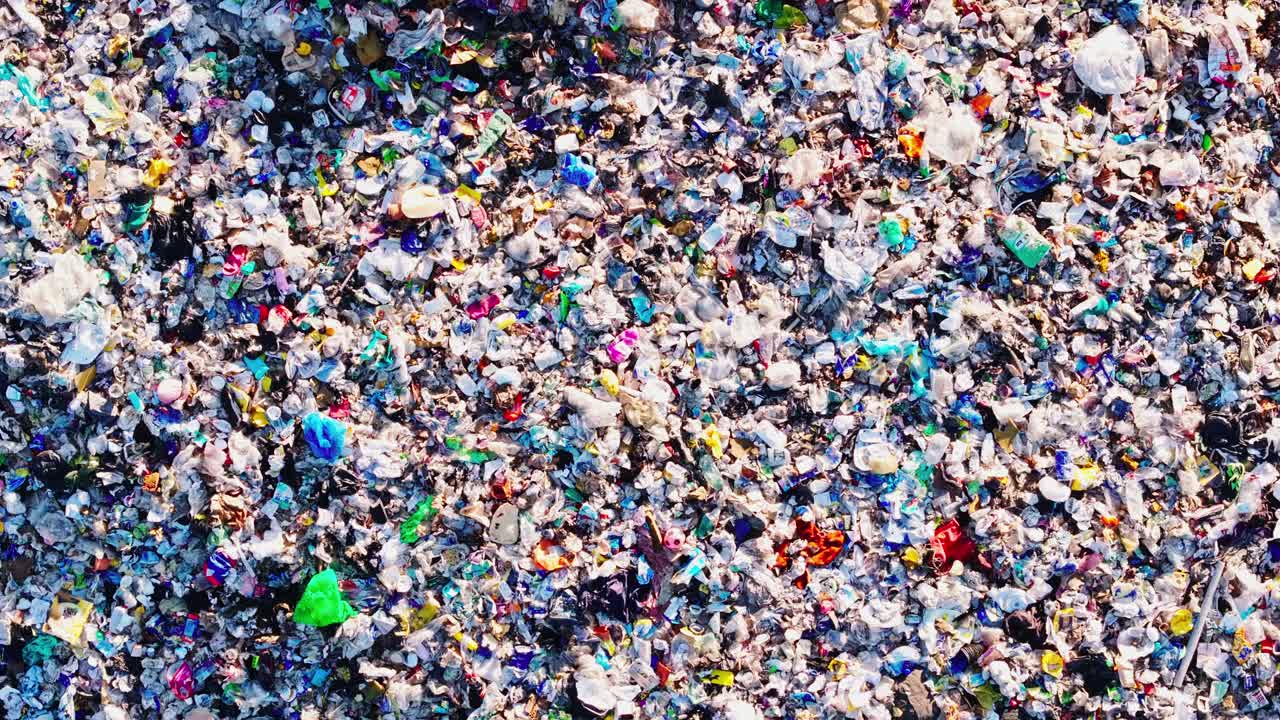 Sunrise drone shot of landfill symbolizing waste crisis and circular economy