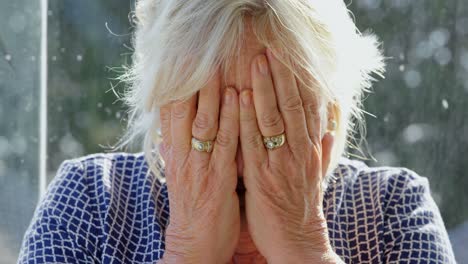 senior woman suffering from headache 4k