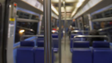 metal handle close up in an empty subway wagon