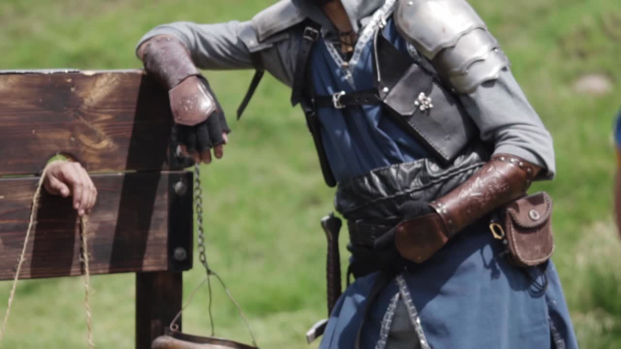 Men in costumes perform a medieval torture reenactment at a fan festival in Mexico.