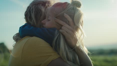 Mom-with-little-daughter-bonding-and-spending-time-together-at-the-meadow.