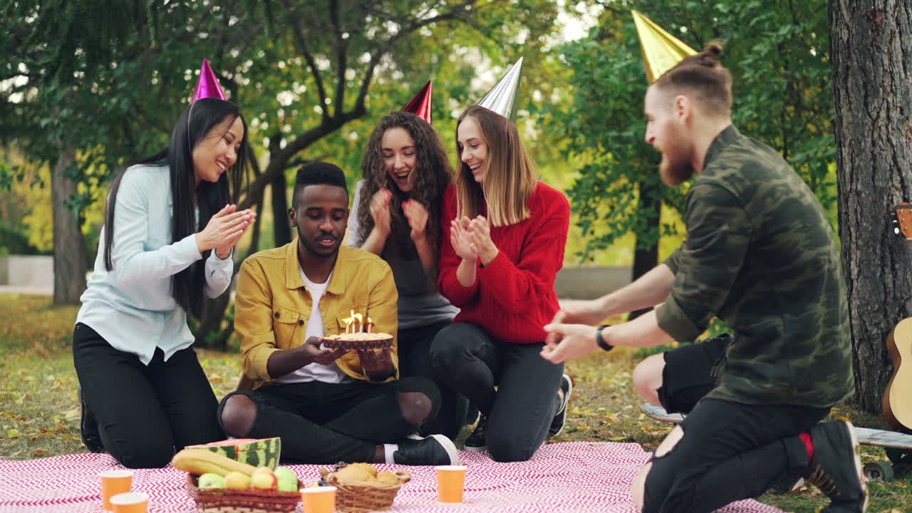 Friends Celebrating Birthday in Park