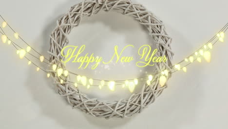 animation of happy new year greetings text with glowing fairy lights and decoration