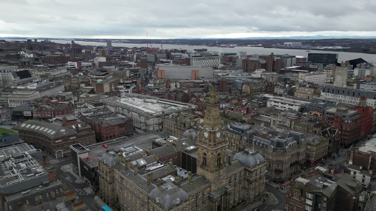Sweeping panoramic view of Liverpool, showcasing the city's iconic skyline ,historic waterfront ,and urban sprawl. Captured from a high or aerial perspective ,the footage highlights unique landmarks