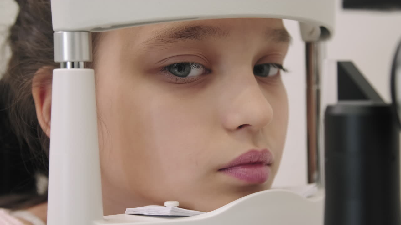 Closeup Of Little Girl At Eye Checkup