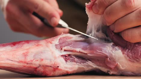 preparing a lamb leg for cooking