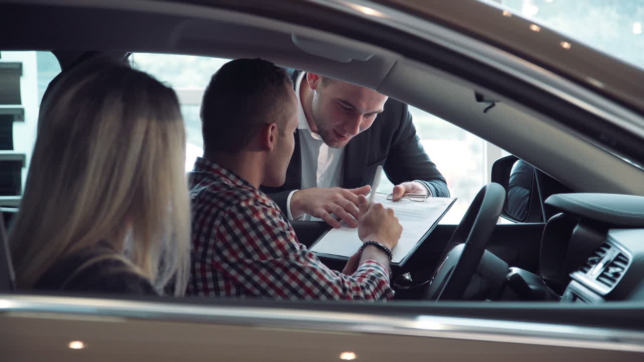 Happy Couple Buying a Car
