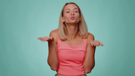 Woman-showing-a-little-bit-gesture-with-sceptic-smile,-showing-minimum-sign,-measuring-small-size