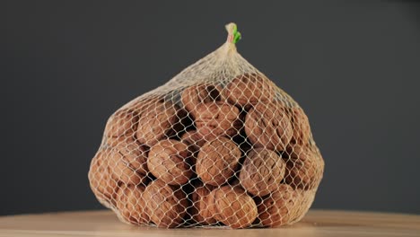 walnuts in a mesh bag