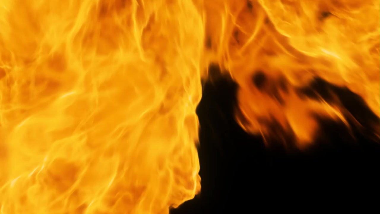 The fire transition effect simulates a blazing flame, seamlessly merging two scenes with flickering orange and red hues, creating a dynamic, warm, and intense visual experience.