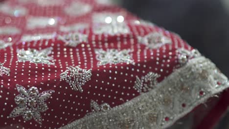 closeup of beautiful traditional sari dress, bridal wedding gown in pakistan and india