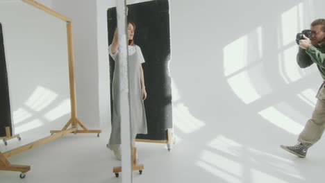 beautiful model walking and posing in studio during photo session