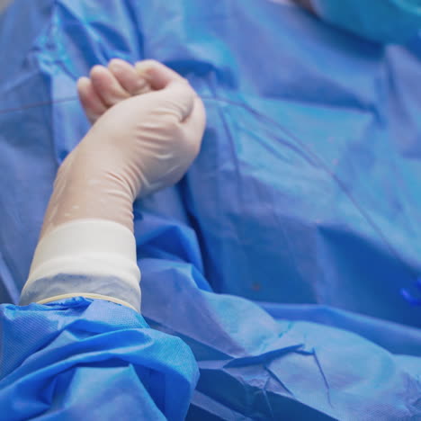 endoscopy in clinic. surgeon and nurse during operation. medical specialists perform a surgery using new equipment in operating room. close-up.