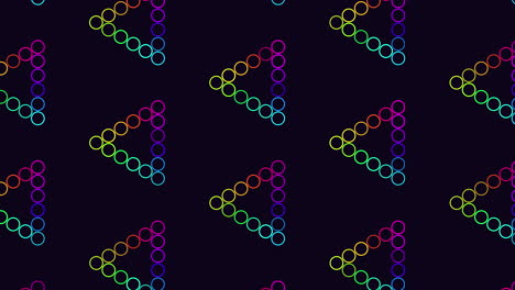 rainbow colored triangles create dynamic zigzag pattern on black background