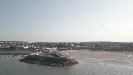 aerial view of beach and small port in balbriggan, republic of ireland - drone shot