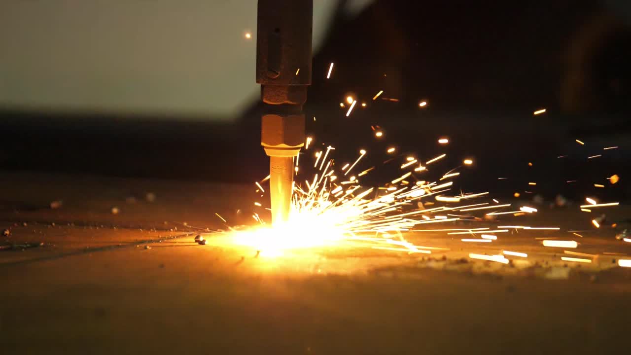 Metal transformed: Watch a blaster machine cut sheet metal with laser precision in this vivid stock footage, a showcase of modern industrial efficiency