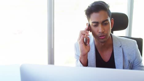 executive talking on mobile phone 4k