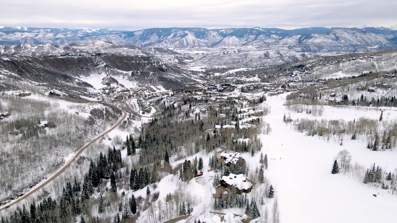 Aerial landscape drone shot of ski resort area in Aspen, Colorado.
