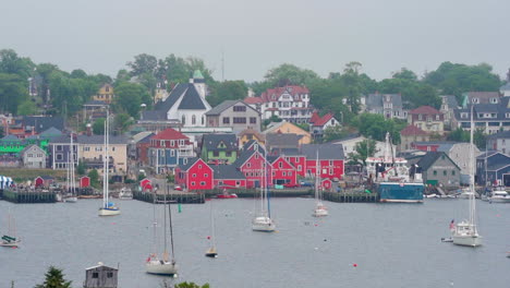 Small-colourful-community-town-in-Nova-Scotia,-Canada-on-an-overcast-day