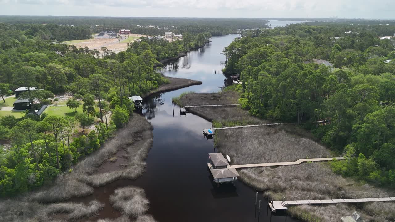 Winding waterway through lush forested area on wildlife surroundings, Panama City Beach, Florida, USA