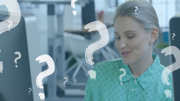 Animation of question mark over caucasian businesswoman in office