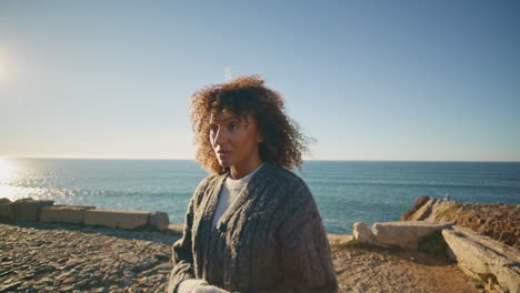 upset woman relaxing beach evening sunlight closeup. sad lady thinking problems