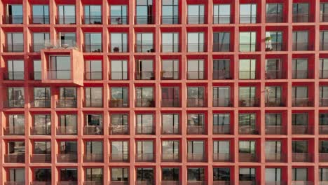 Aerial-birds-eye-view-of-building-facade-at-Mexico,-pedestal-movement