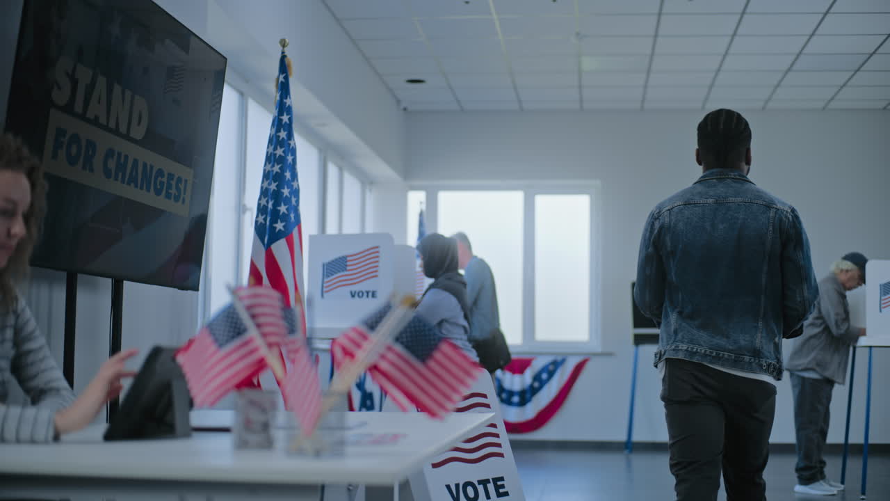 People Voting at a Polling Station during an Election