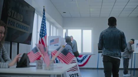 people voting at a polling station during an election