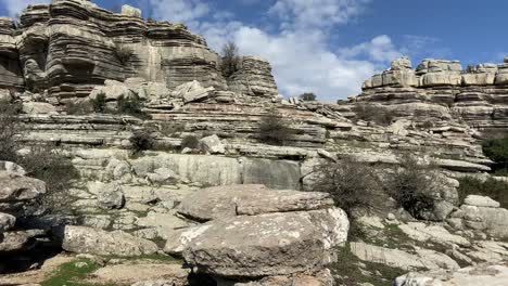 Brief-tour-through-a-mountainous-area-of-rocky-paths-through-the-karstic-landscape-in-El-Torcal-de-Antequera,-Spain