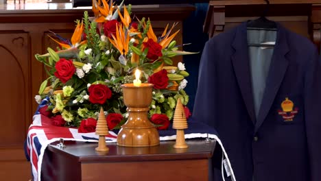 closeup-shot-of-a-funeral-casket-in-a-hearse-or-chapel-or-burial-at-cemetery