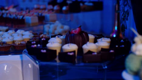 Chocolate-and-strawberry-cake-on-dessert-table-display,-push-out