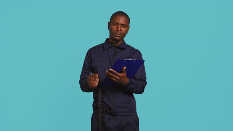 private law enforcement worker using pen to write down orders received