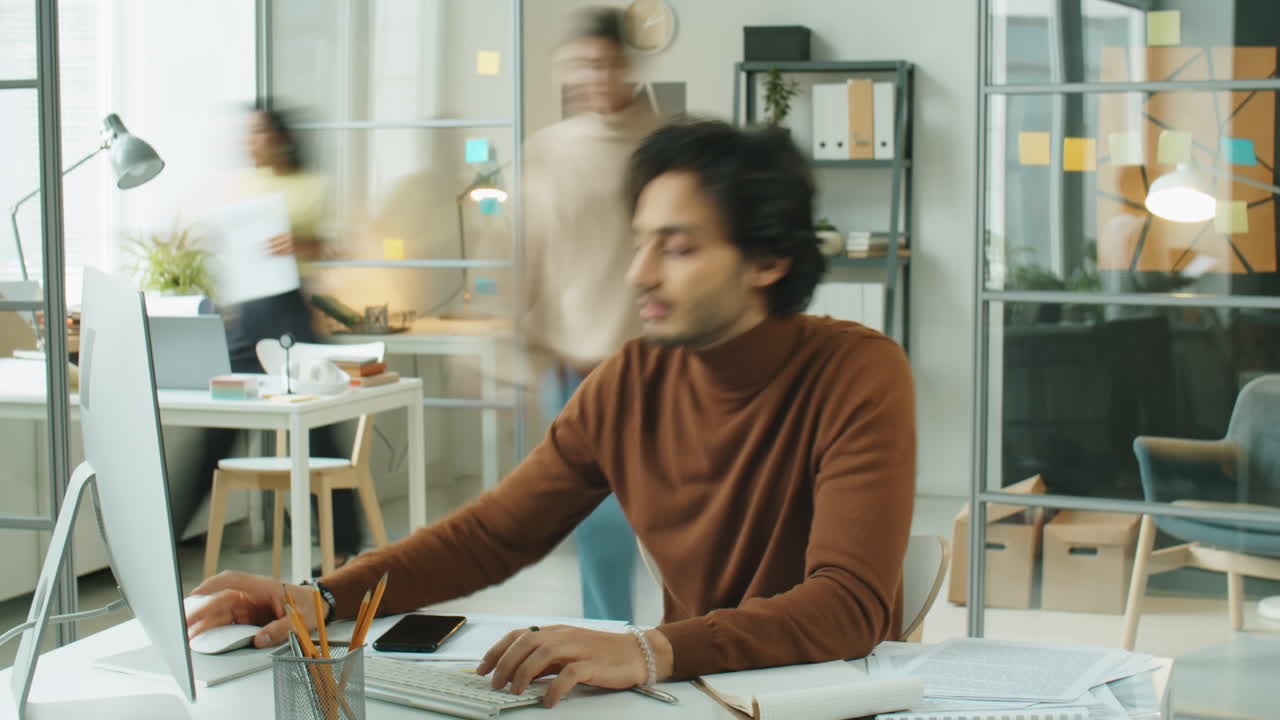 Time Lapse of Middle Eastern Manager Working in Office