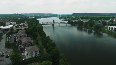 Railway-Bridge-Over-The-Arkansas-River-In-Little-Rock,-USA---aerial-drone-shot