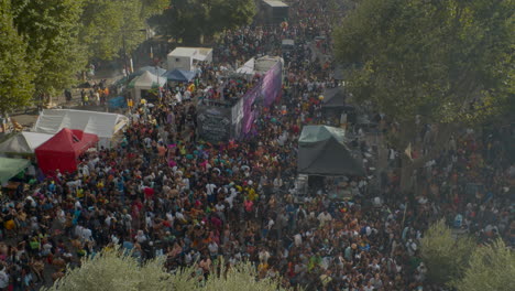 aerial birds eye view large crowd of people in street for outdoor event